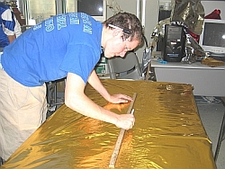 John Billings Measures Mylar Sheets