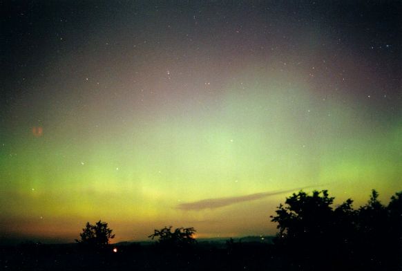 Clouds backlit by aurora