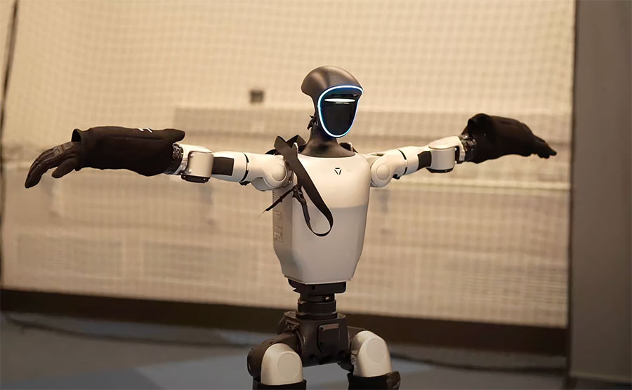  A humanoid robot stands with its arms spread.
